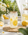 Frosted can cup with lemon and daisy design.