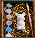 Paintable ceramic bear figurine kit with paintbrush and assorted paint colors