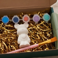 Paintable ceramic bear figurine kit with paintbrush and assorted paint colors