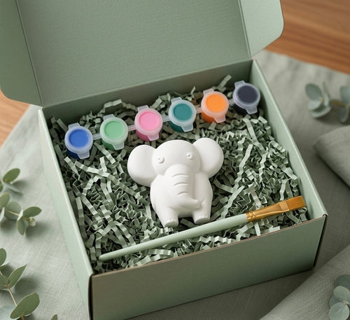 Paintable ceramic elephant figurine kit with paintbrush and assorted paint colors