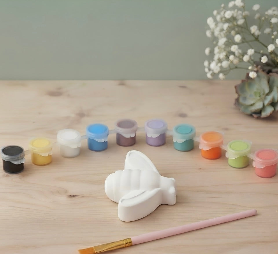 Paintable ceramic bumblebee figurine kit with paintbrush and assorted paint colors