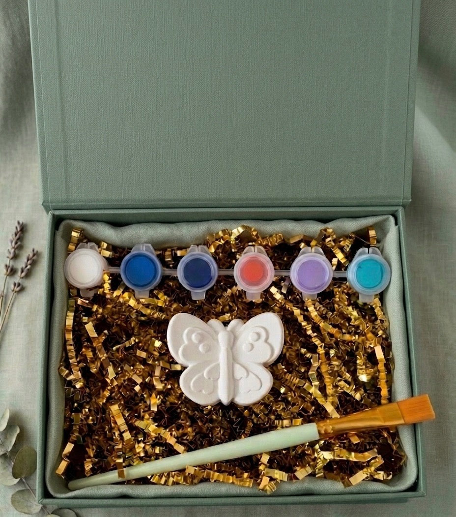 Paintable ceramic butterfly figurine kit with paintbrush and assorted paint colors