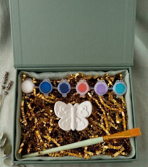 Paintable ceramic butterfly figurine kit with paintbrush and assorted paint colors