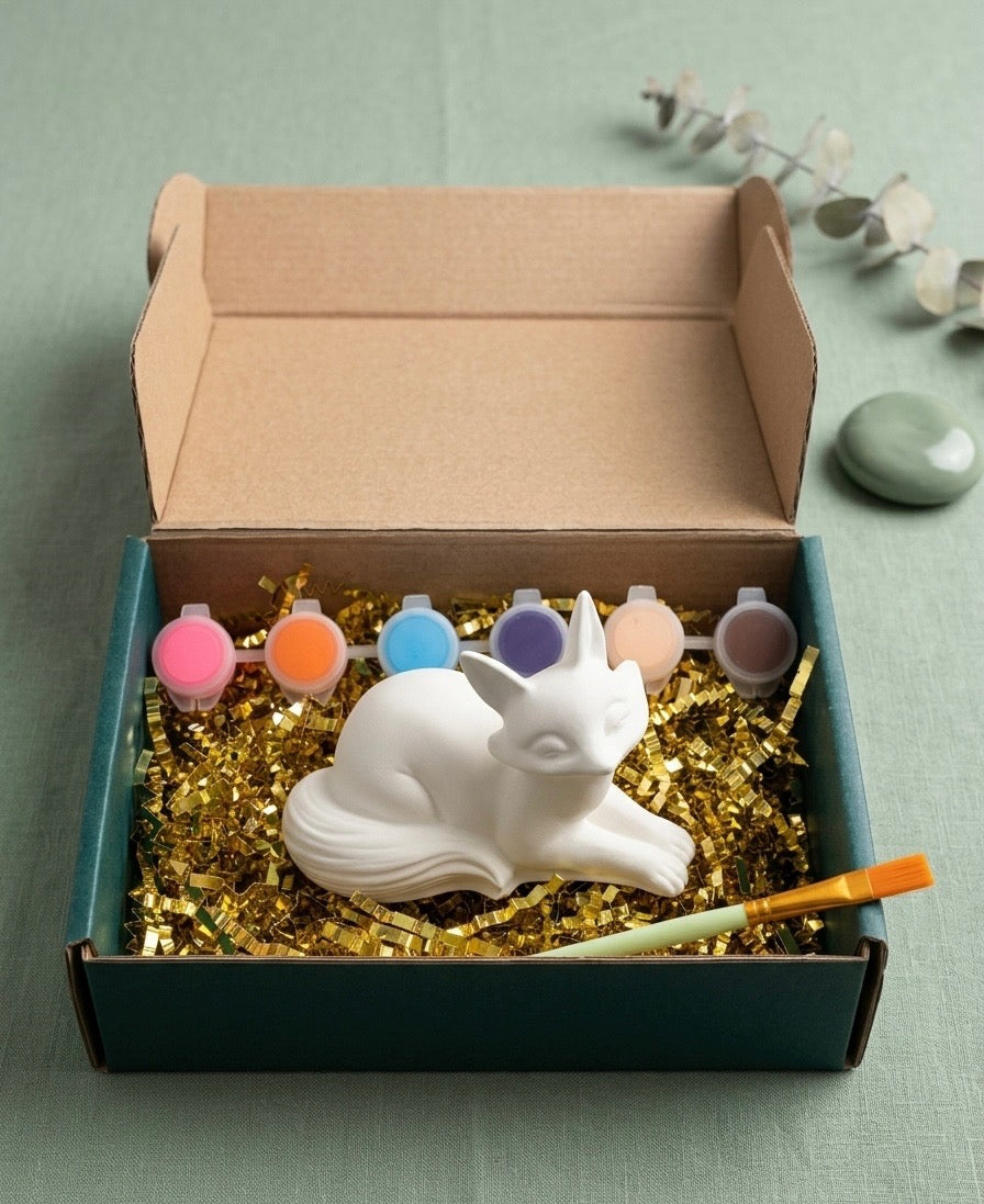 Paintable ceramic fox figurine kit with paintbrush and assorted paint colors