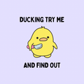 A round, 2-inch fridge magnet with a yellow cartoon duckling holding a butter knife with text 'Ducking try me and find out' on a light purple background
