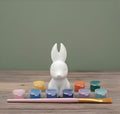 Paintable ceramic bunny rabbit figurine kit with paintbrush and assorted paint colors