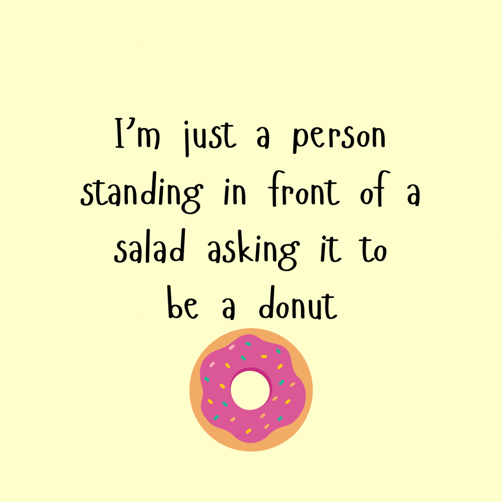 A round, 2-inch fridge magnet with a cartoon donut with pink icing and sprinkles on a yellow background with text, 'I'm just a person standing in front of a salad asking it to be a donut'