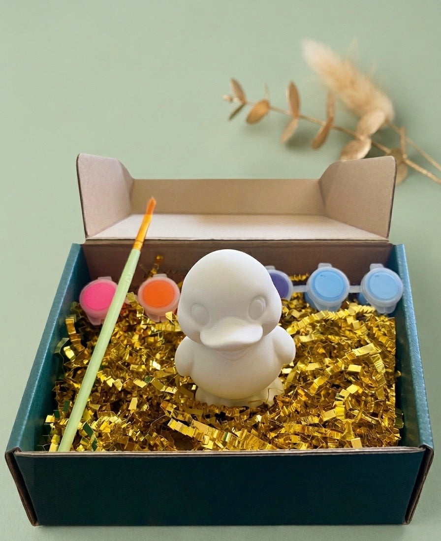 Paintable ceramic duckling figurine kit with paintbrush and assorted paint colors