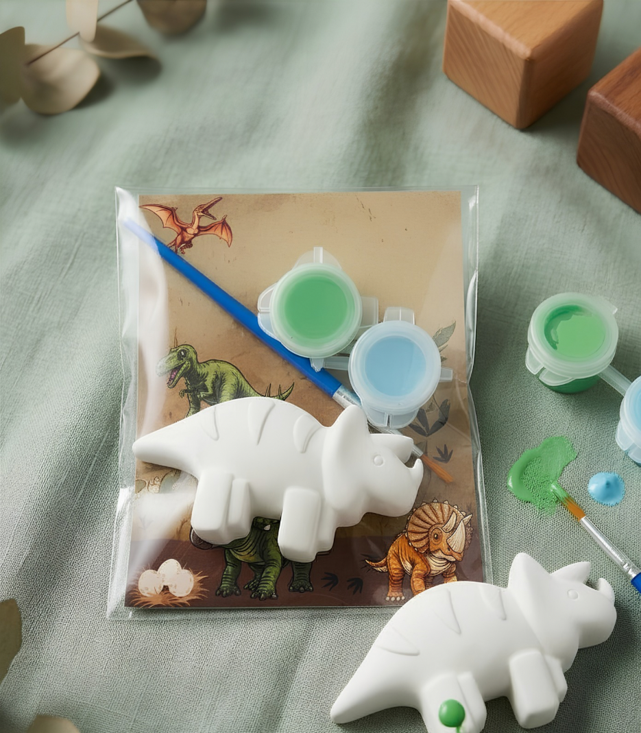 Paintable ceramic triceratops figurine kit with paintbrush and assorted paint colors
