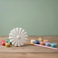 Paintable ceramic flower figurine kit with paintbrush and assorted paint colors