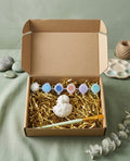 Paintable ceramic dinosaur figurine kit with paintbrush and assorted paint colors