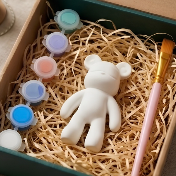 Paintable ceramic bear figurine kit with paintbrush and assorted paint colors