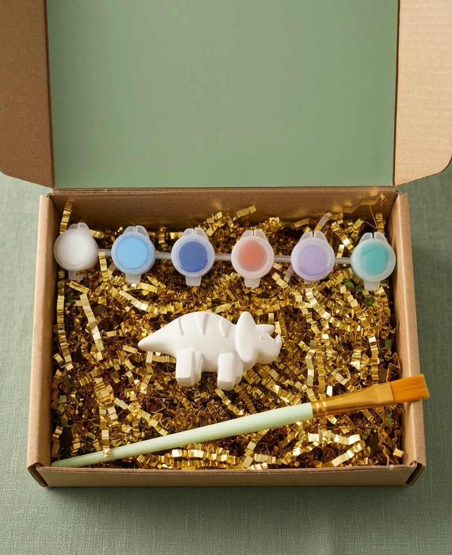 Paintable ceramic dinosaur figurine kit with paintbrush and assorted paint colors