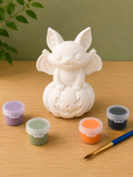 Paintable ceramic bat figurine kit with paintbrush and assorted paint colors