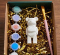 Paintable ceramic bear figurine kit with paintbrush and assorted paint colors