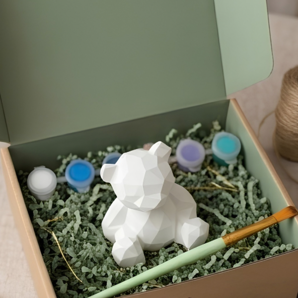 Paintable ceramic bear figurine kit with paintbrush and assorted paint colors