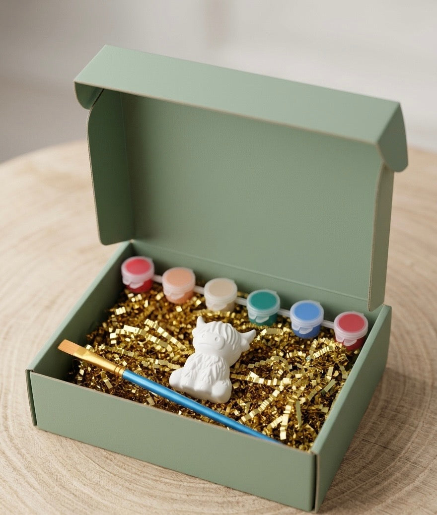 Paintable ceramic highland cow figurine kit with paintbrush and assorted paint colors