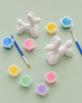 Paintable ceramic balloon dog figurine kit with paintbrush and assorted paint colors