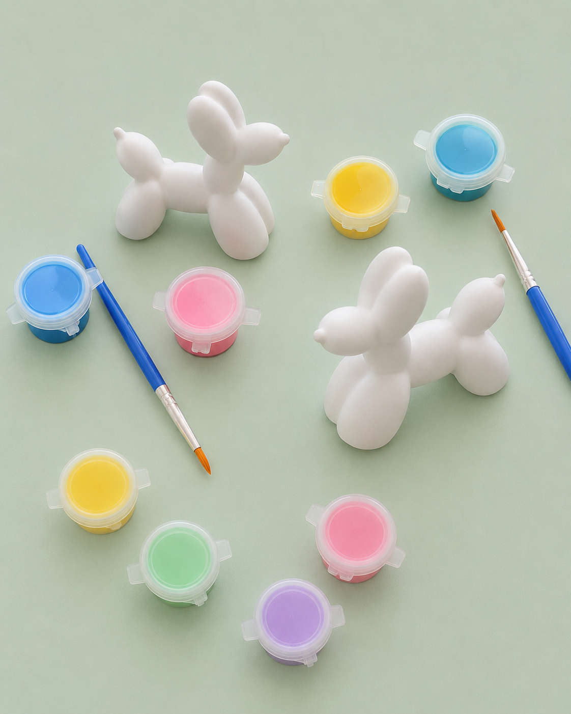 Paintable ceramic balloon dog figurine kit with paintbrush and assorted paint colors