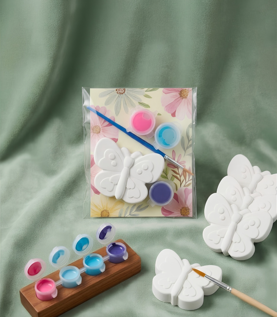 Paintable ceramic butterfly figurine kit with paintbrush and assorted paint colors