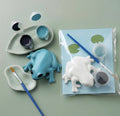 Paintable ceramic frog figurine kit with paintbrush and assorted paint colors