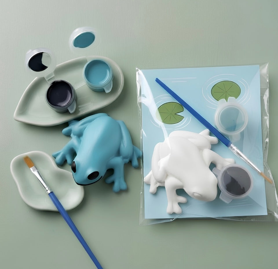 Paintable ceramic frog figurine kit with paintbrush and assorted paint colors
