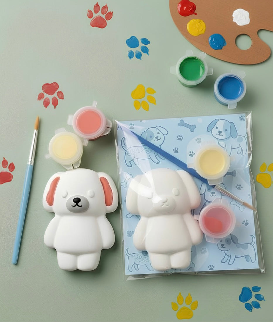 Paintable ceramic dog figurine kit with paintbrush and assorted paint colors
