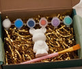 Paintable ceramic bear figurine kit with paintbrush and assorted paint colors