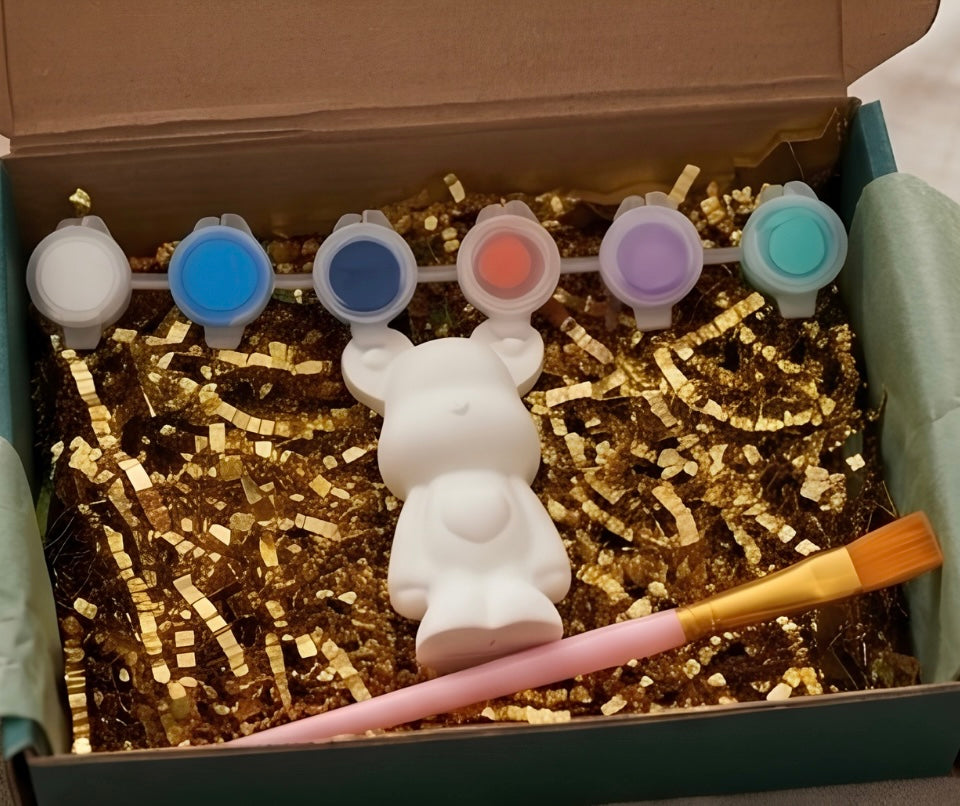 Paintable ceramic bear figurine kit with paintbrush and assorted paint colors