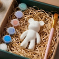 Paintable ceramic bear figurine kit with paintbrush and assorted paint colors