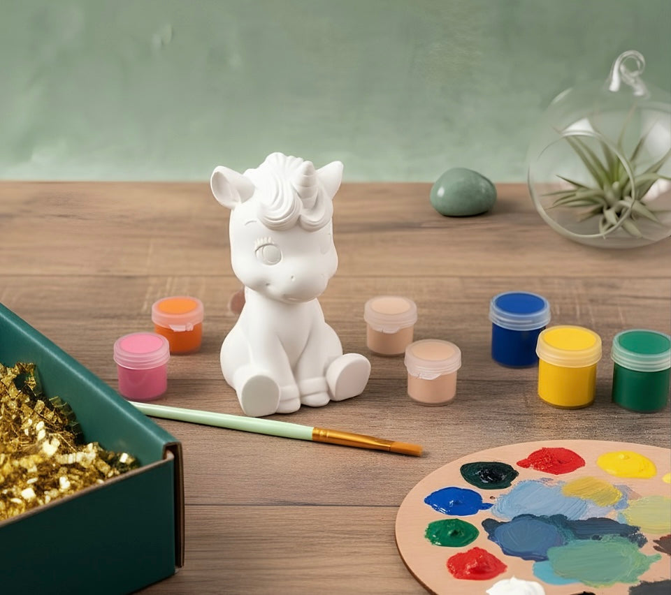Paintable ceramic unicorn figurine kit with paintbrush and assorted paint colors