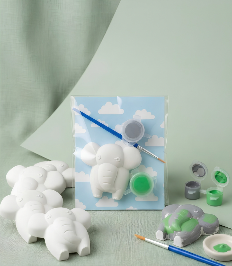 Paintable ceramic elephant figurine kit with paintbrush and assorted paint colors