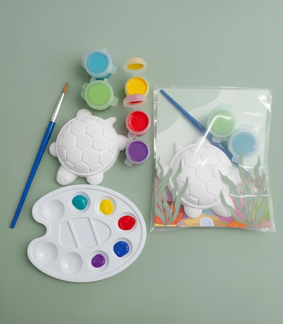 Paintable ceramic turtle figurine kit with paintbrush and assorted paint colors