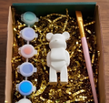 Paintable ceramic bear figurine kit with paintbrush and assorted paint colors