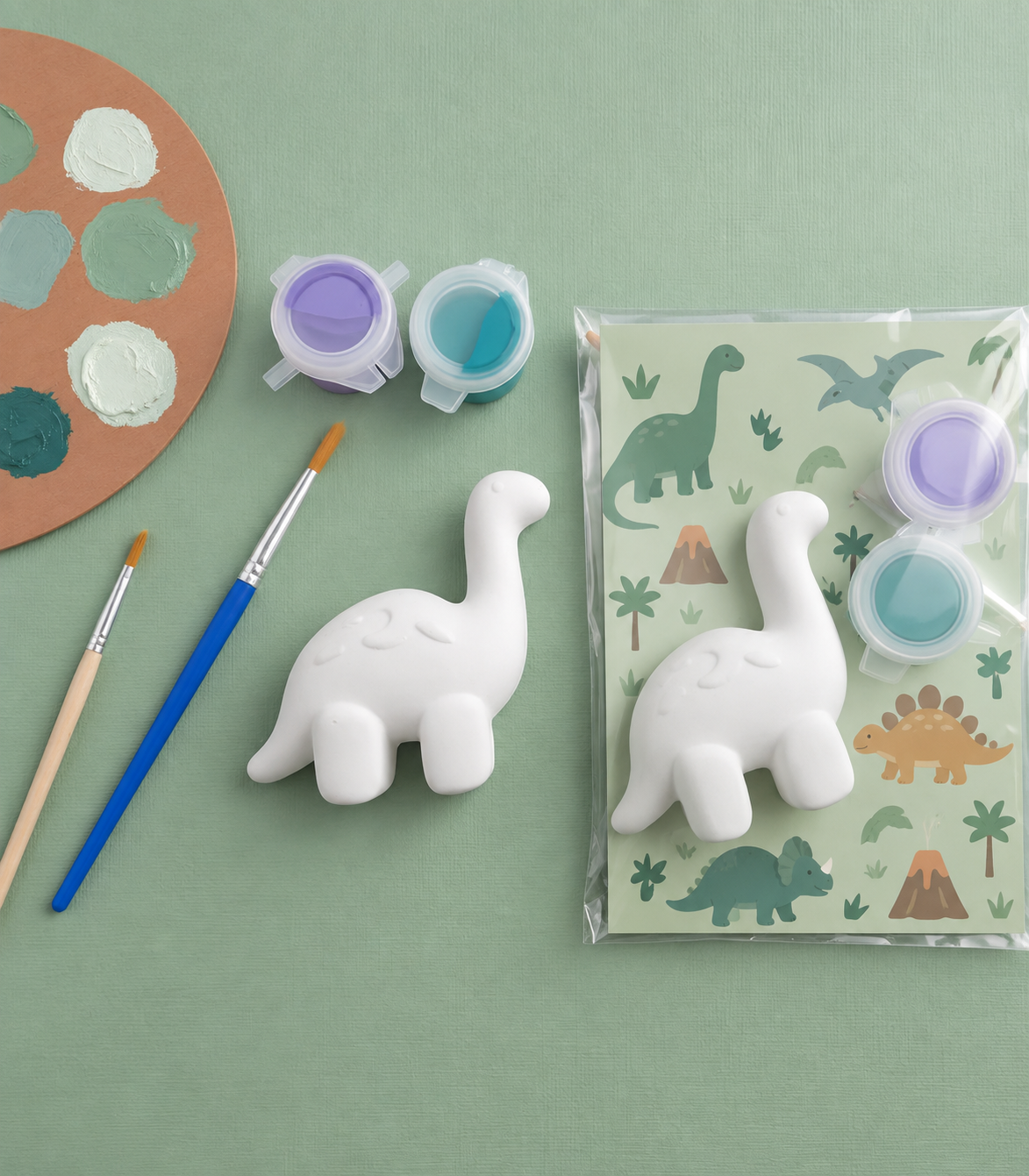 Paintable ceramic brachiosaurus figurine kit with paintbrush and assorted paint colors