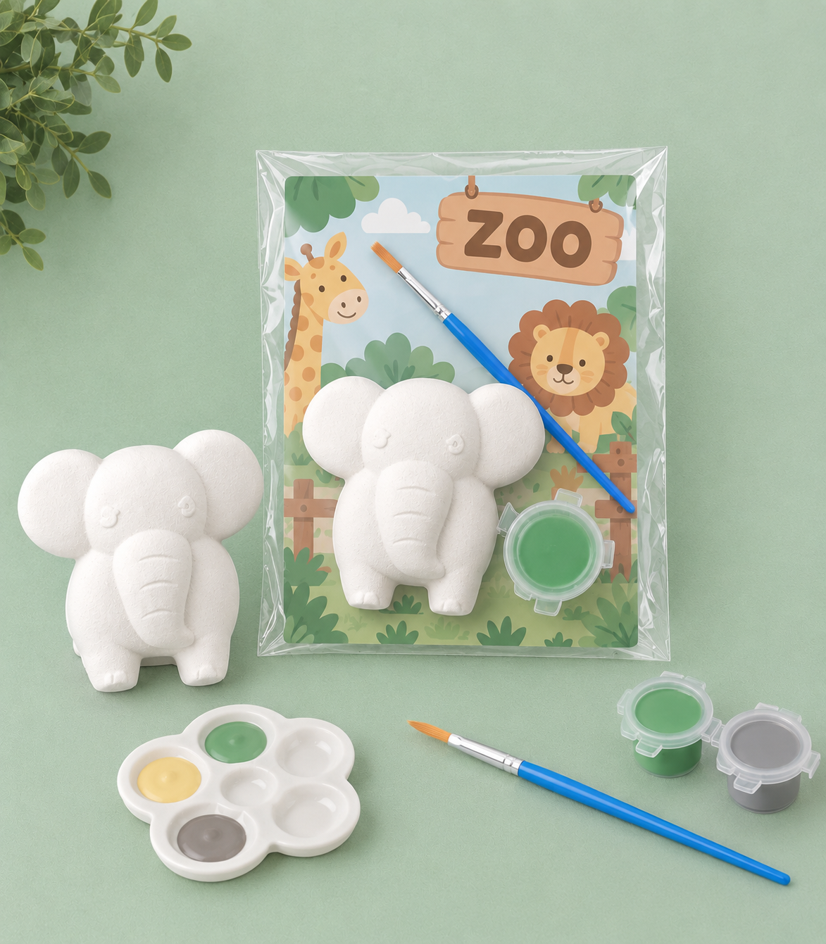 Paintable ceramic elephant figurine kit with paintbrush and assorted paint colors