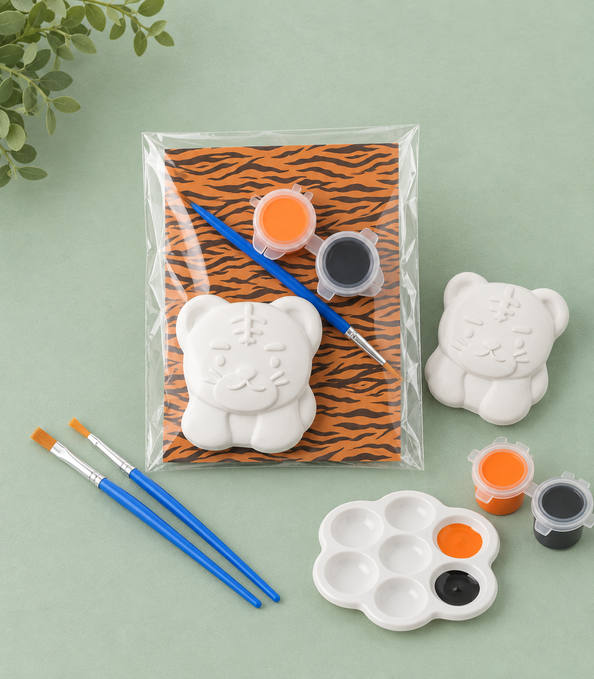 Paintable ceramic tiger figurine kit with paintbrush and assorted paint colors