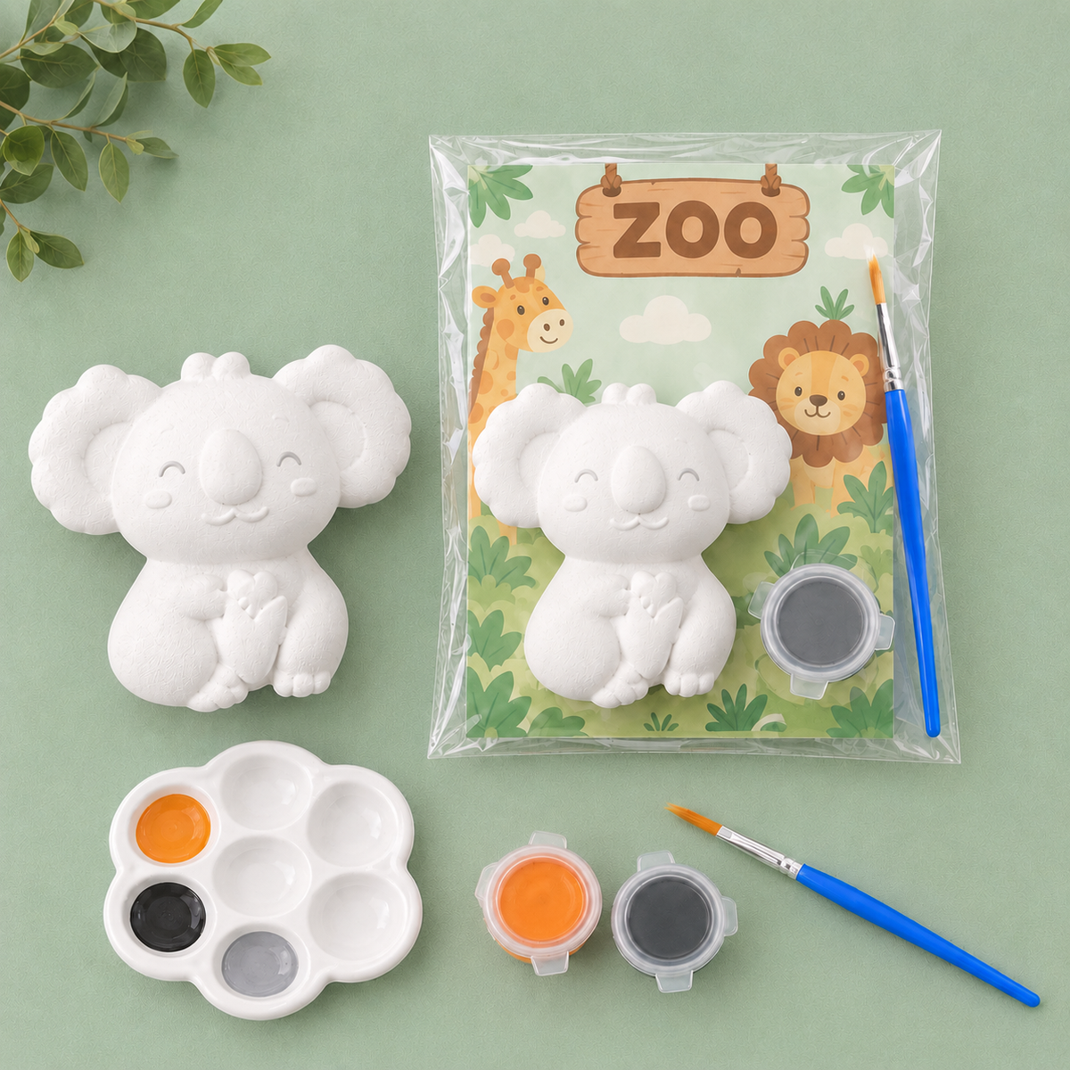 Paintable ceramic koala figurine kit with paintbrush and assorted paint colors