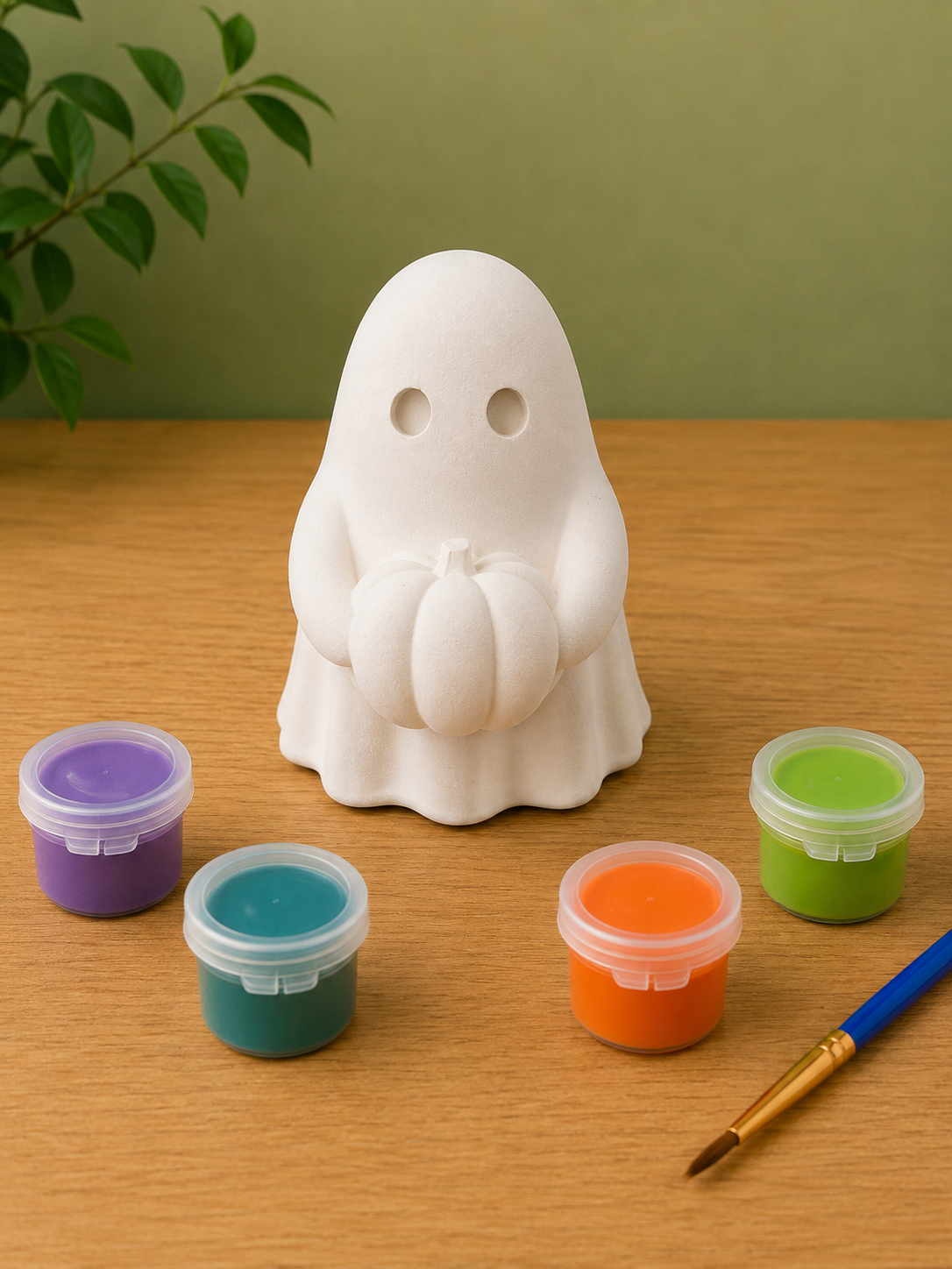 Paintable ceramic ghost figurine kit with paintbrush and assorted paint colors